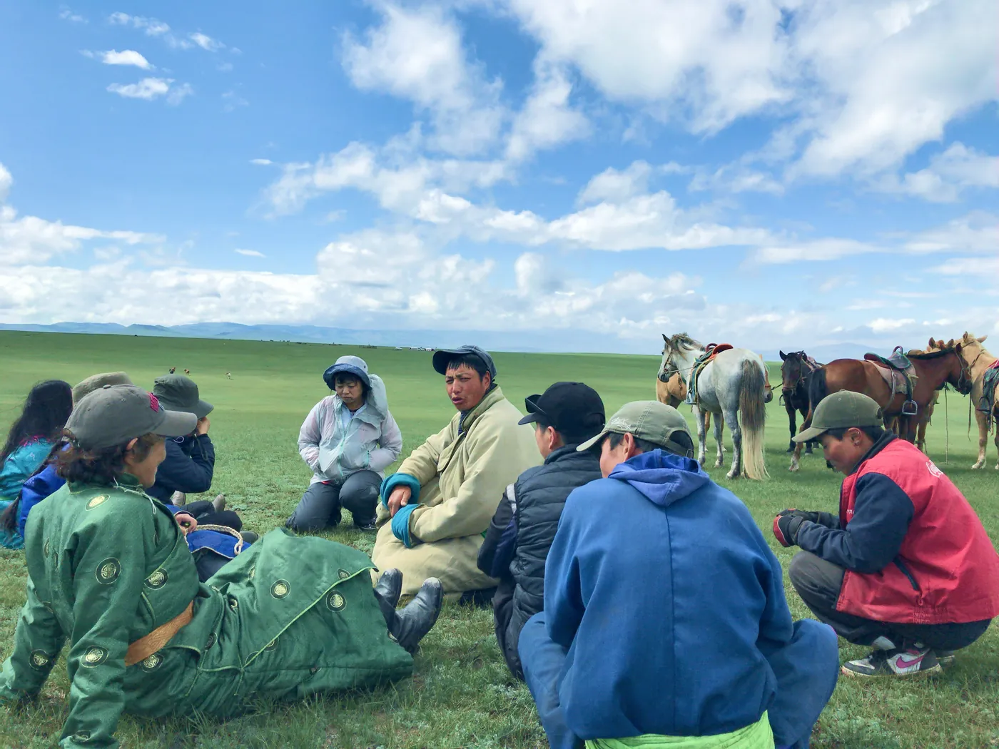Our nomad guides resting on the steppe